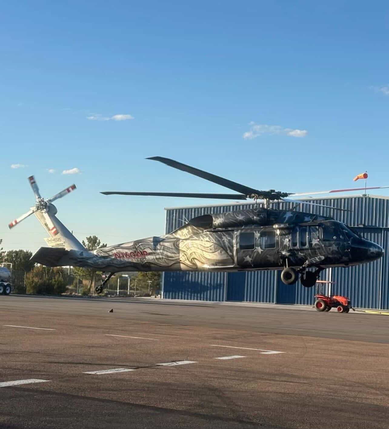 Custom Black Hawk hovering at Mesa base