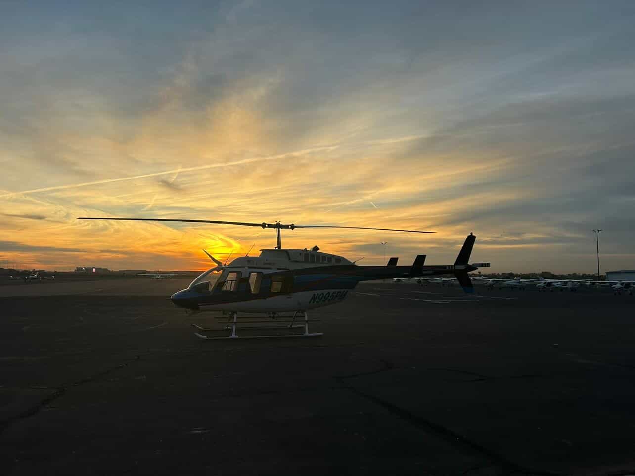 Bell 206 at golden hour sunset